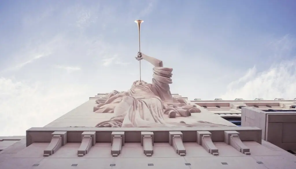Angel Statue with Trumpet on Building
